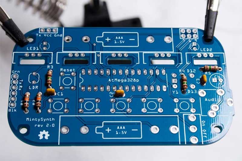 Add small yellow ceramic capacitors, C1, C2, and C3