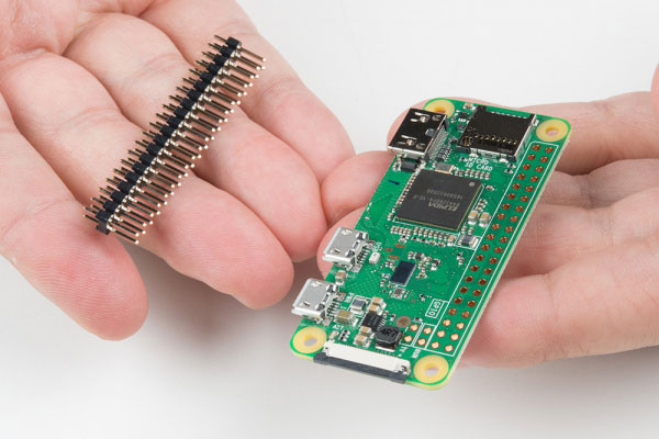 Solder the male headers onto the Pi Zero W